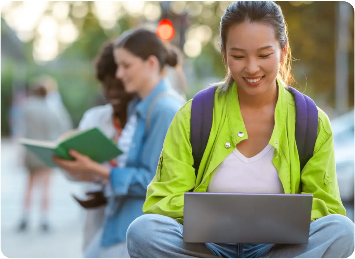 Female College Student Using Laptop