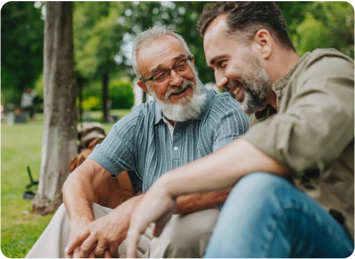 Father and Son Chatting in the Park