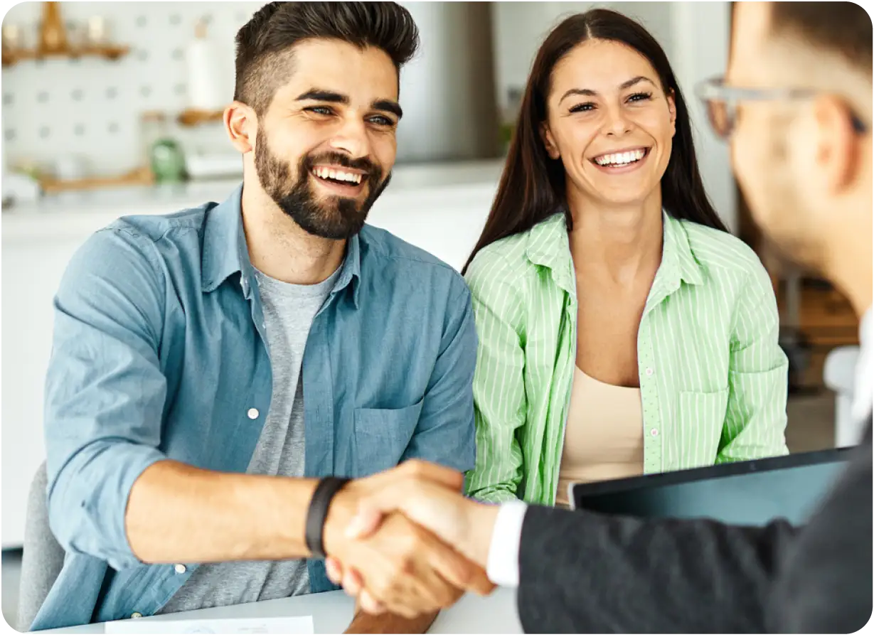 Couple Shaking Hands with Advisor