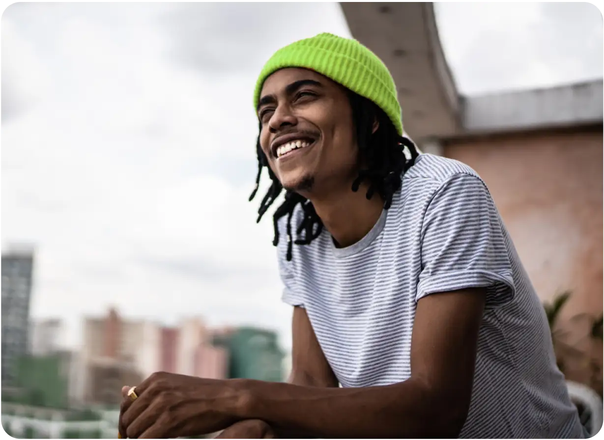 Man Enjoying Day on Balcony