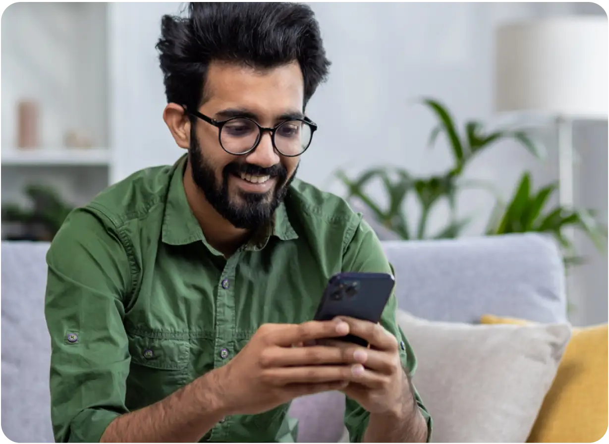Man Looking at Phone Screen
