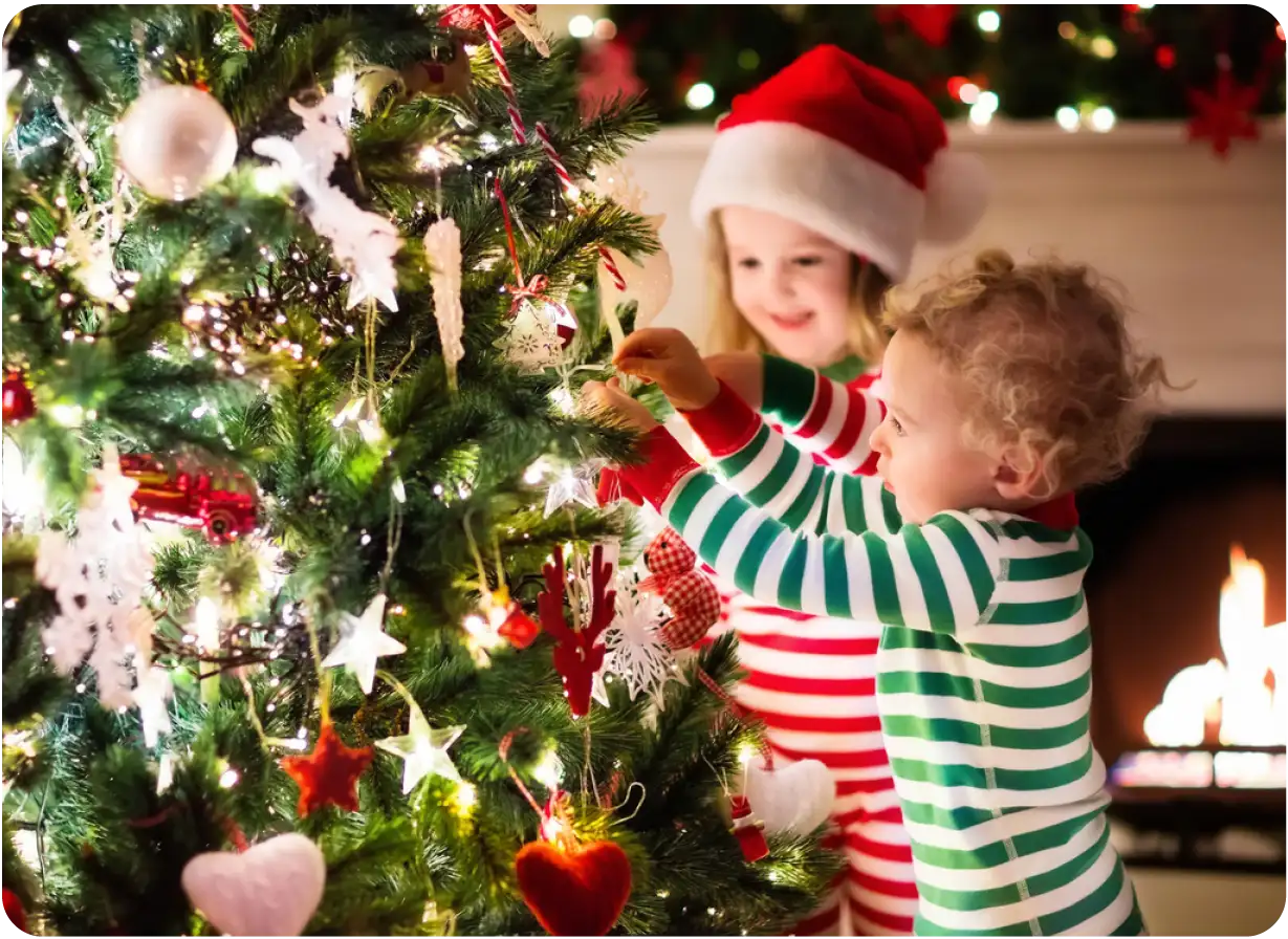 Children Decorating Christmas Tree