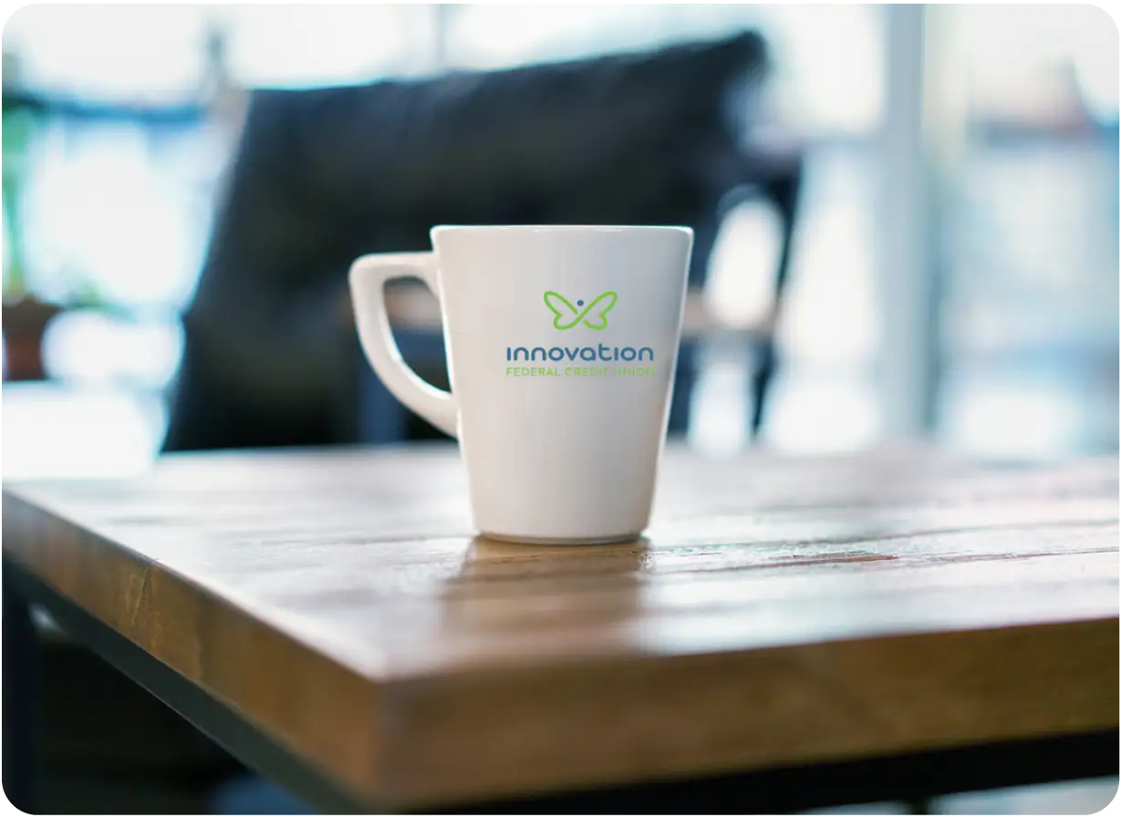 Innovation Coffee Mug on Board Room Table