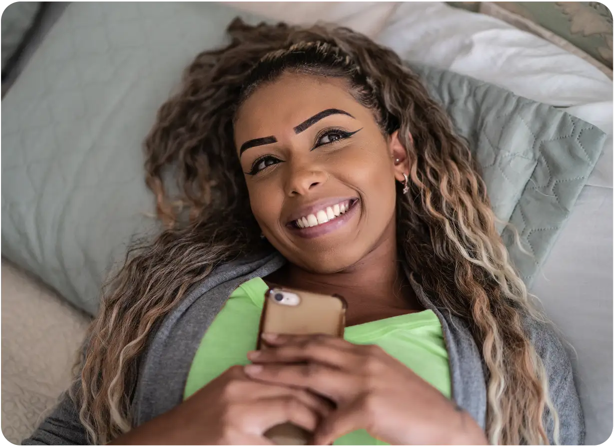Woman Relaxing Holding Her Phone