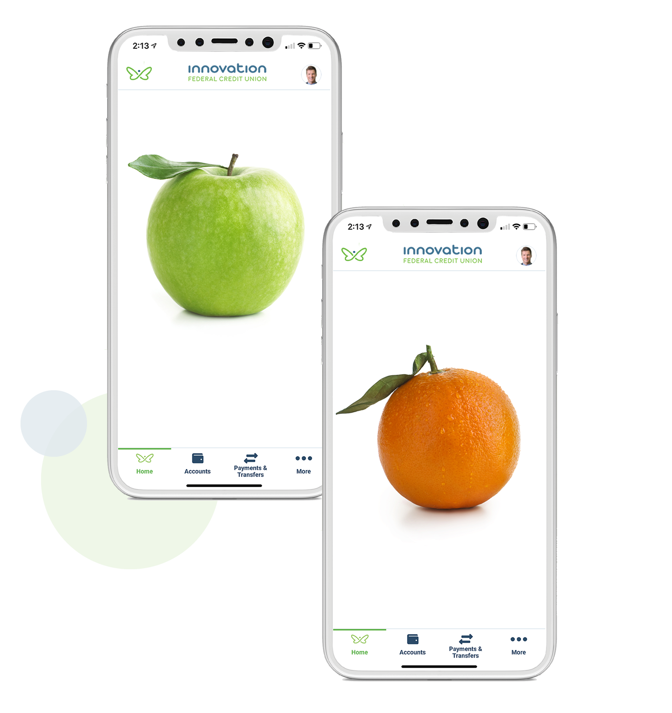 Two mobile phones are side by side. One displays a photo of an apple on its screen. The other displays a photo of an orange.