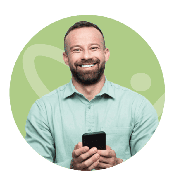smiling man with phone
