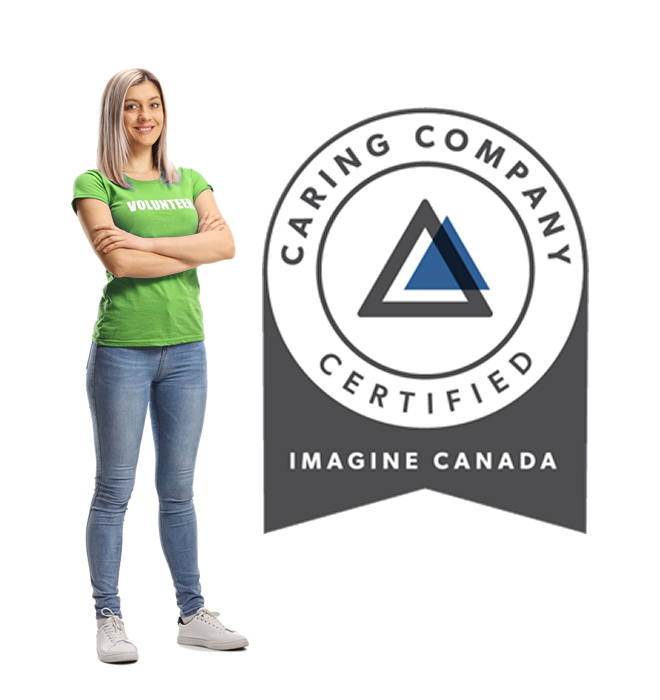A female wearing a volunteer t-shirt standing next to the Caring Company logo