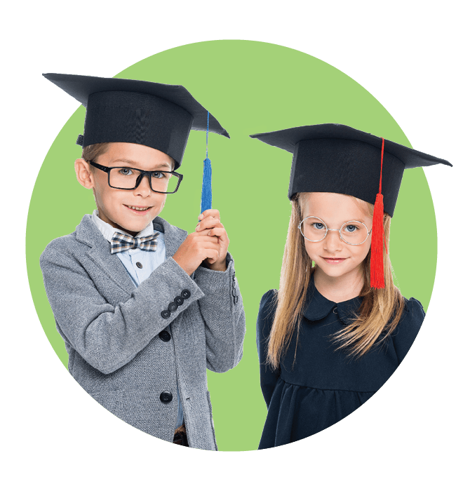 Young children in graduation caps