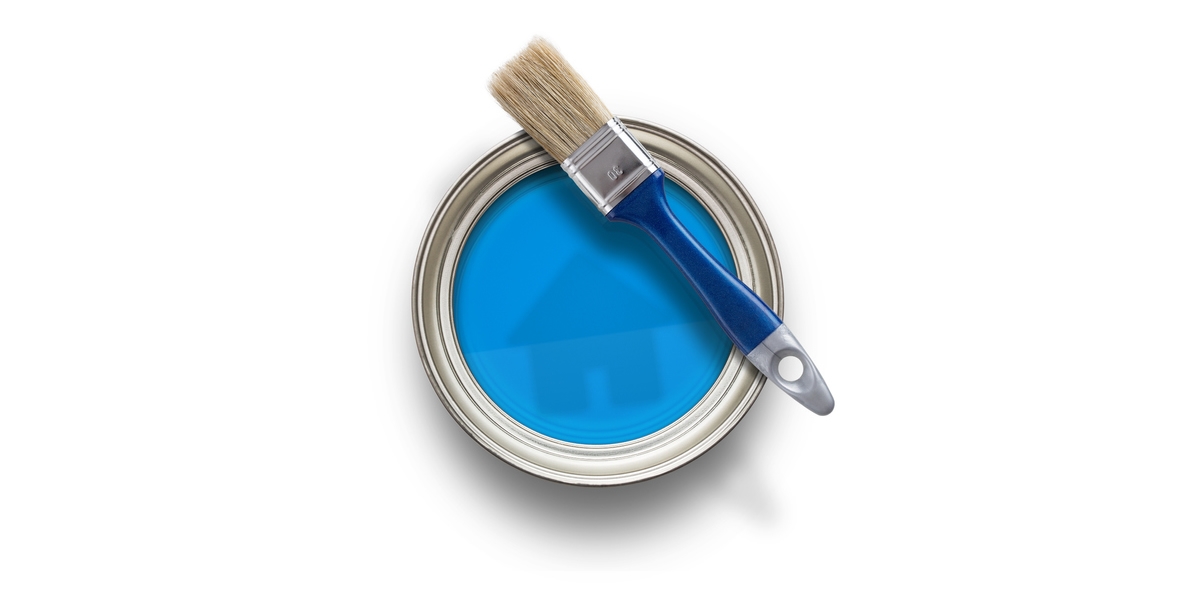 Can of blue paint with a house shadow in the paint