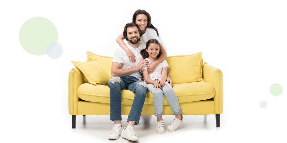 Family sitting on a couch