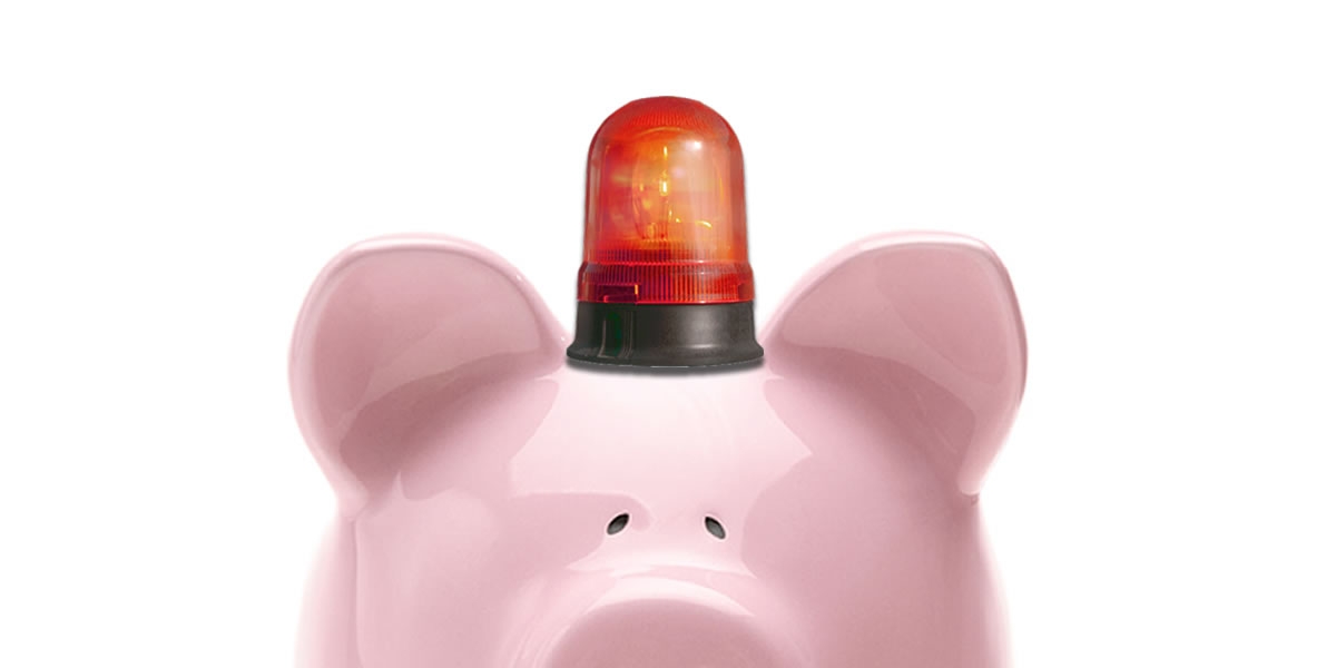 Piggy bank with a red siren on his head