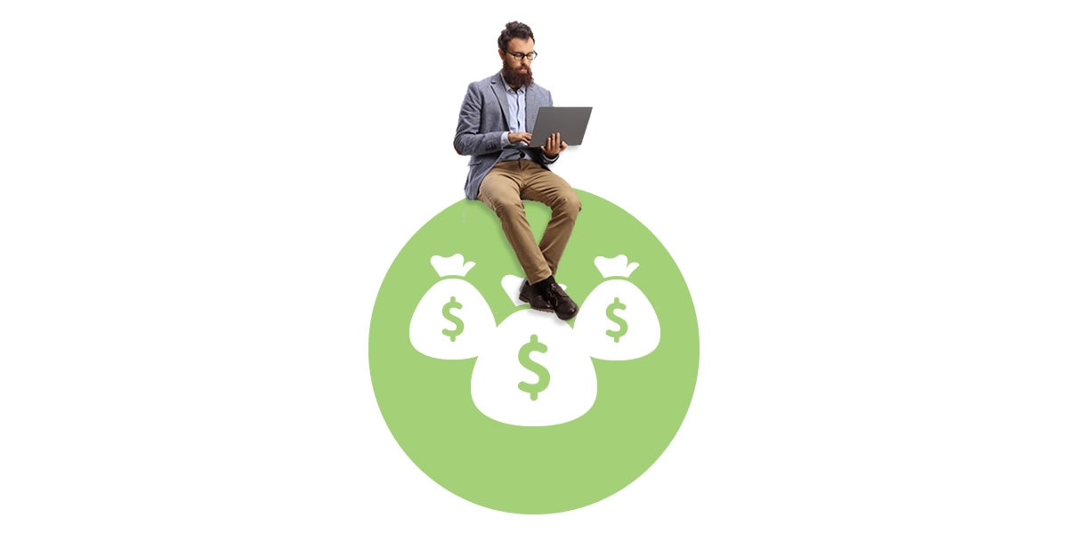 A man using a laptop sitting on money bag icons