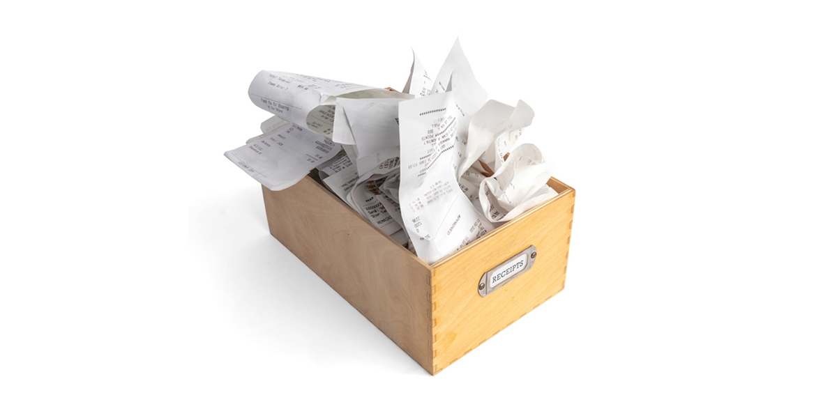Overflowing box of receipts