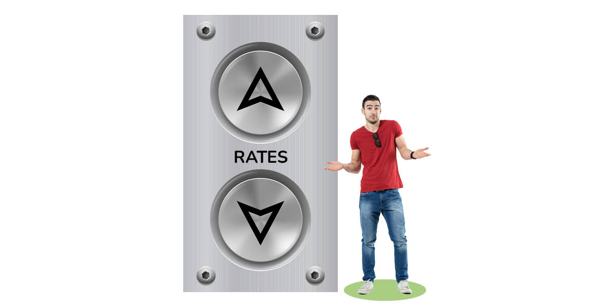 A confused male stands beside an elevator switch marked "RATES"