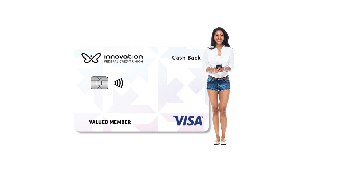 Woman standing beside Visa card