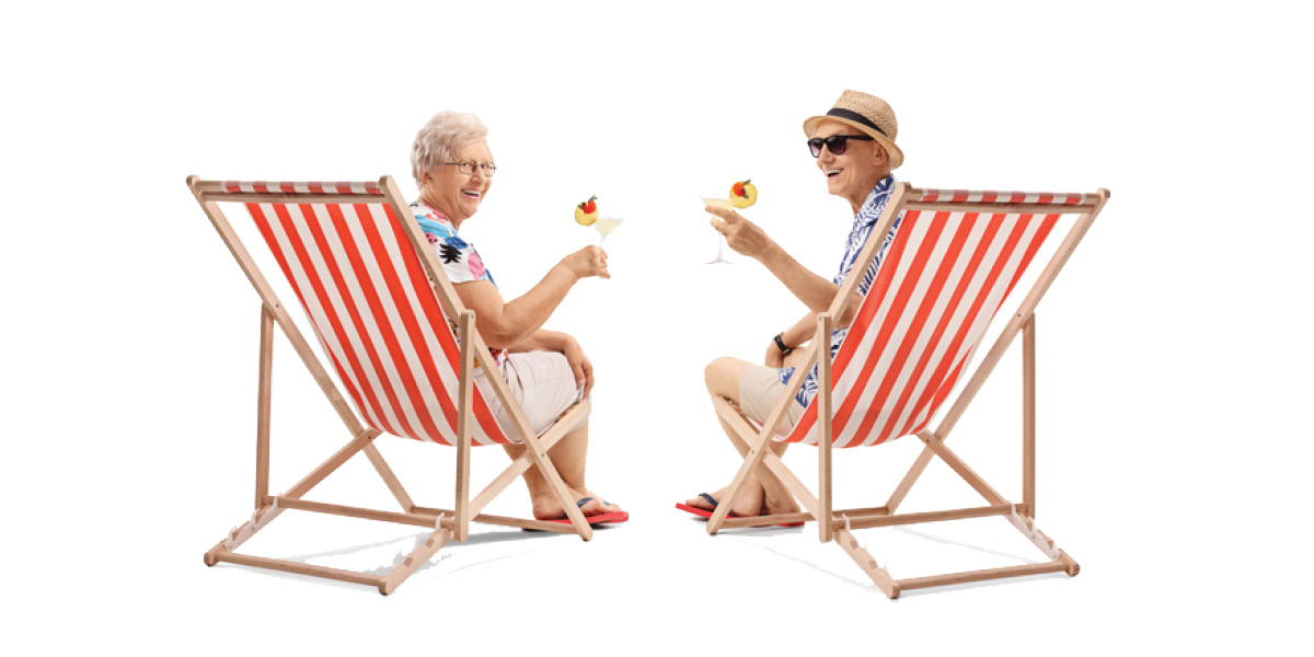 Retired Couple Sitting on Beach Chairs