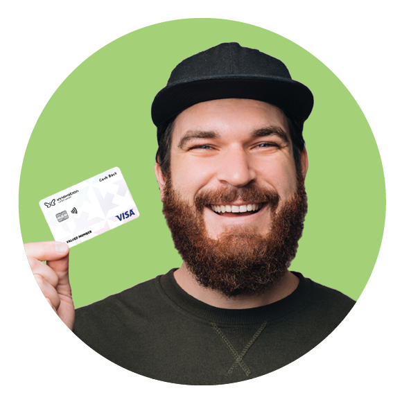 Smiling man holding Cash Back Visa card