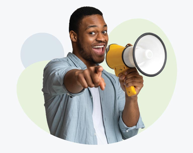 Happy man using megaphone