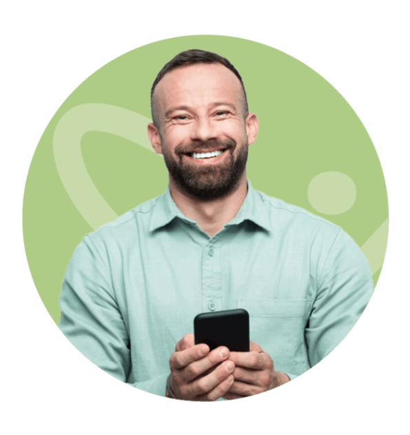smiling man with phone