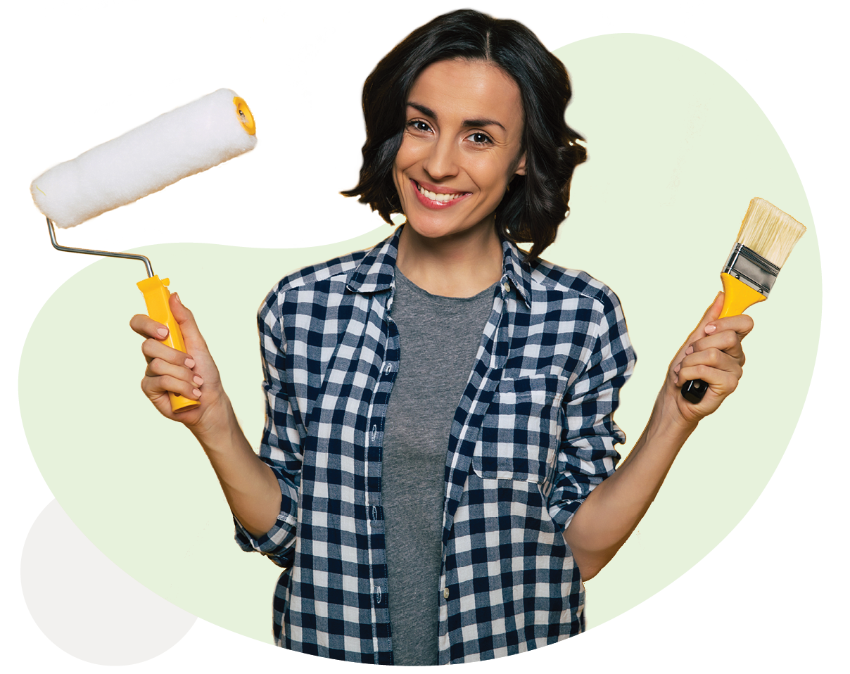 Happy woman with paint brush and roller