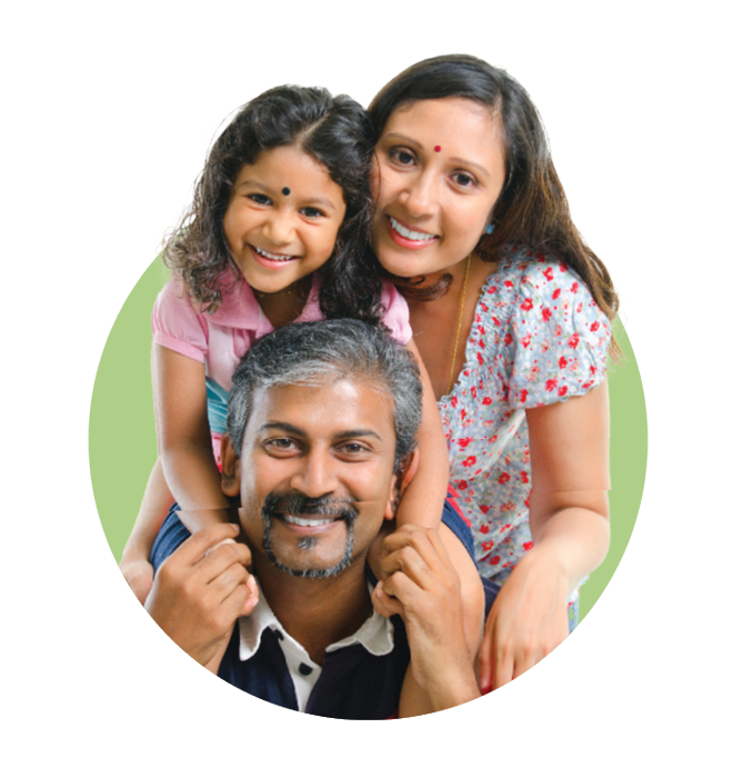 Smiling dad, mom, and daughter